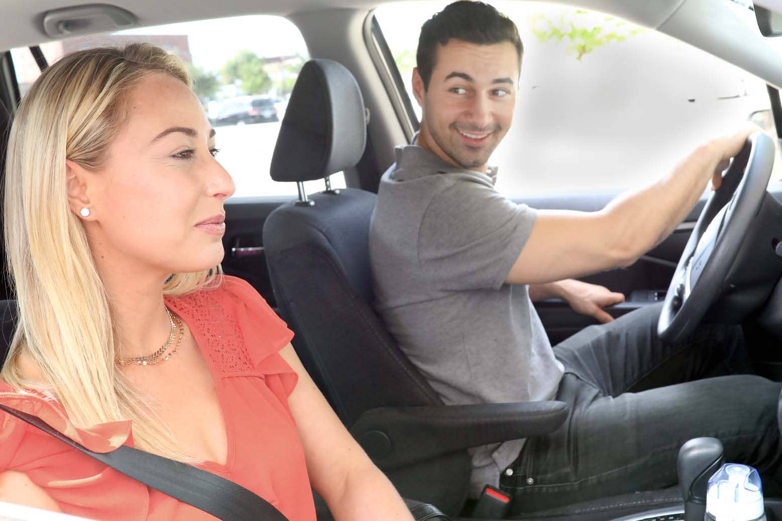 couple driving in a car