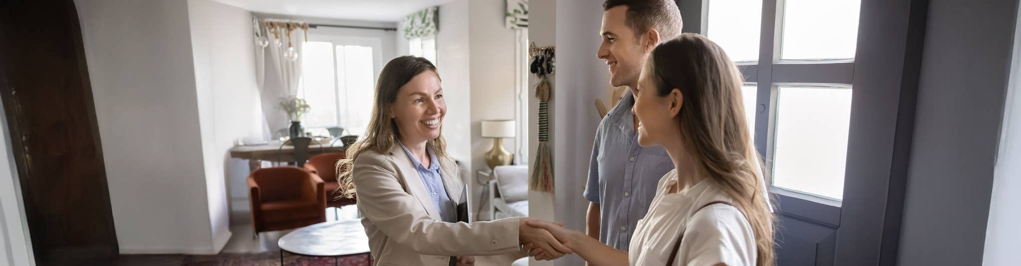 Landlord shaking hands with tentant