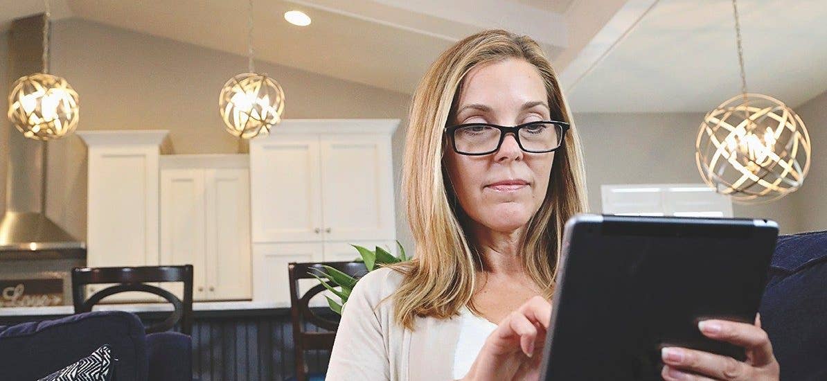 Woman with a tablet looking for insurance